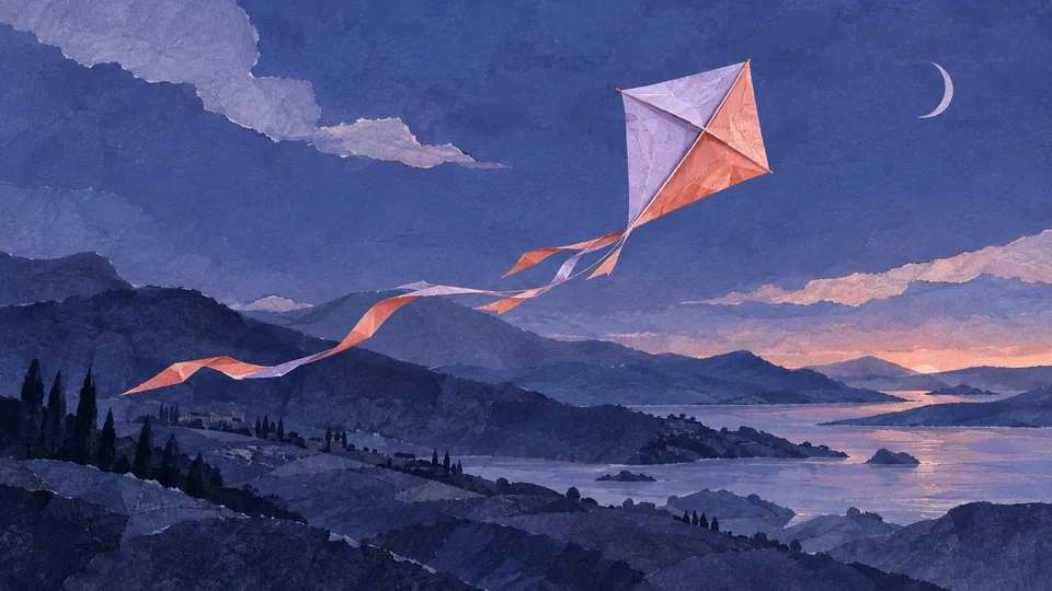 A painted paper kite above an indigo landscape